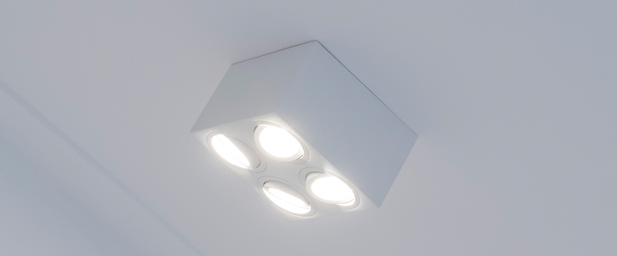 spot en saillie rond blanc au plafond